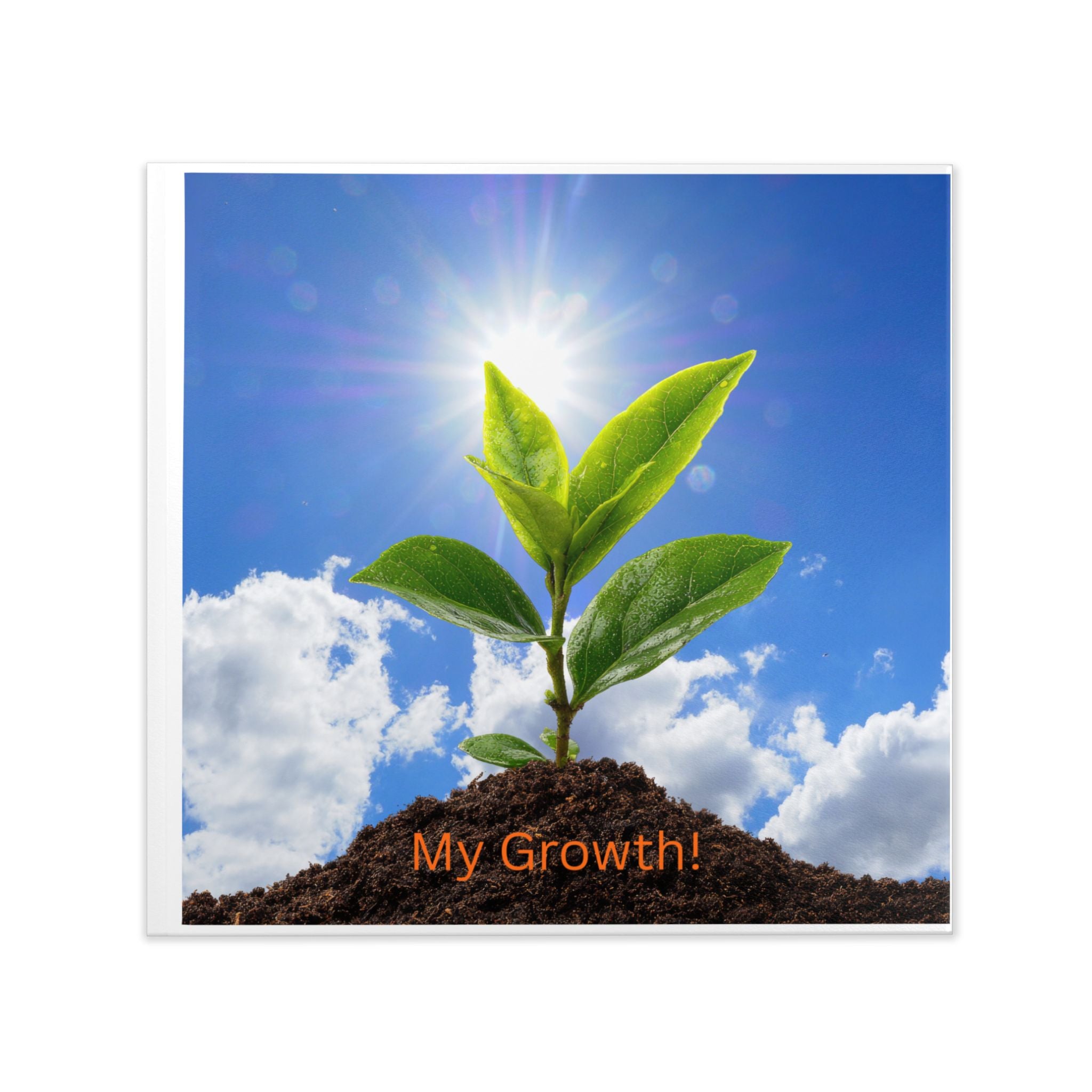 Hardcover photo book with green sapling cover art and orange “My Growth!” text