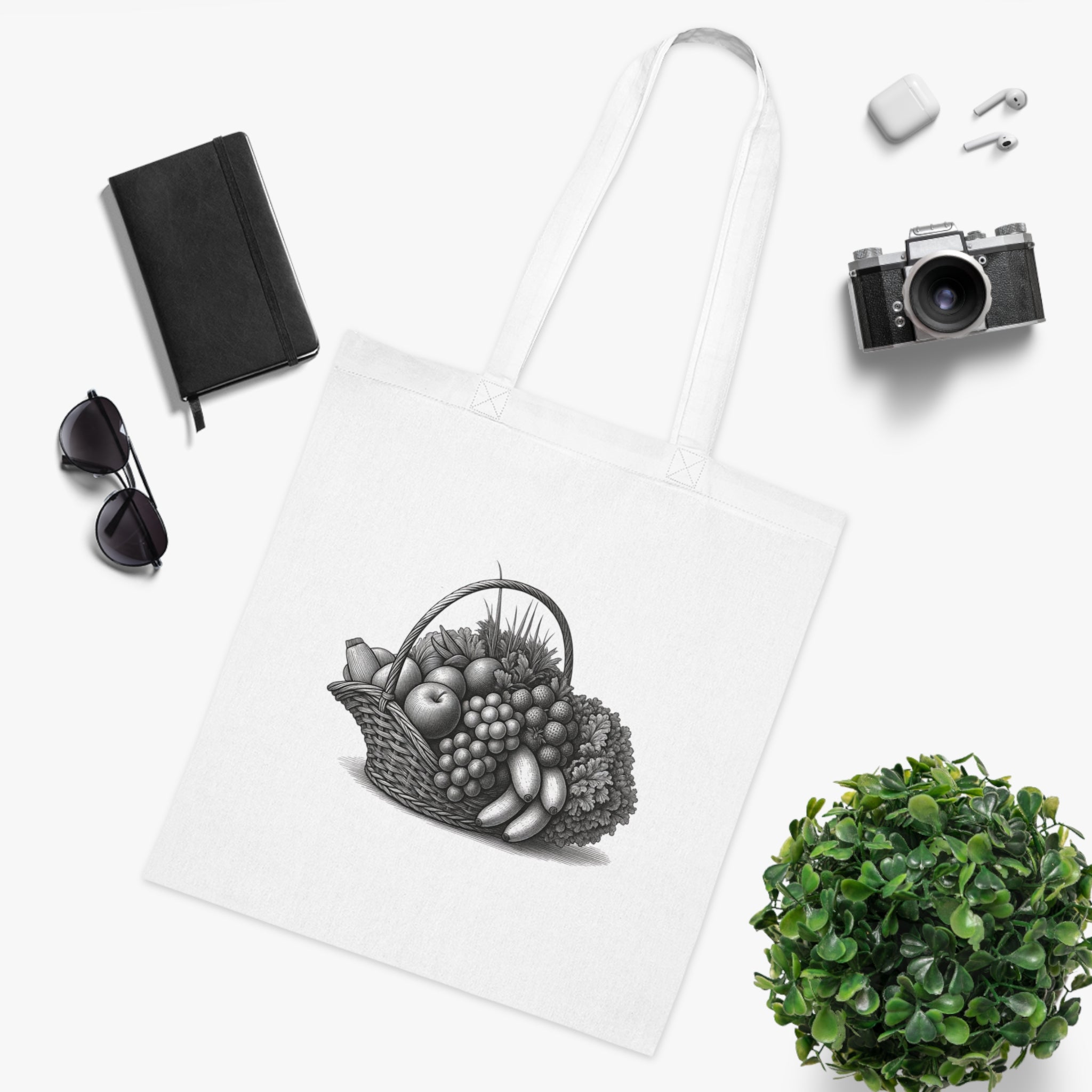 White cotton tote bag with fruit basket graphic and long handles