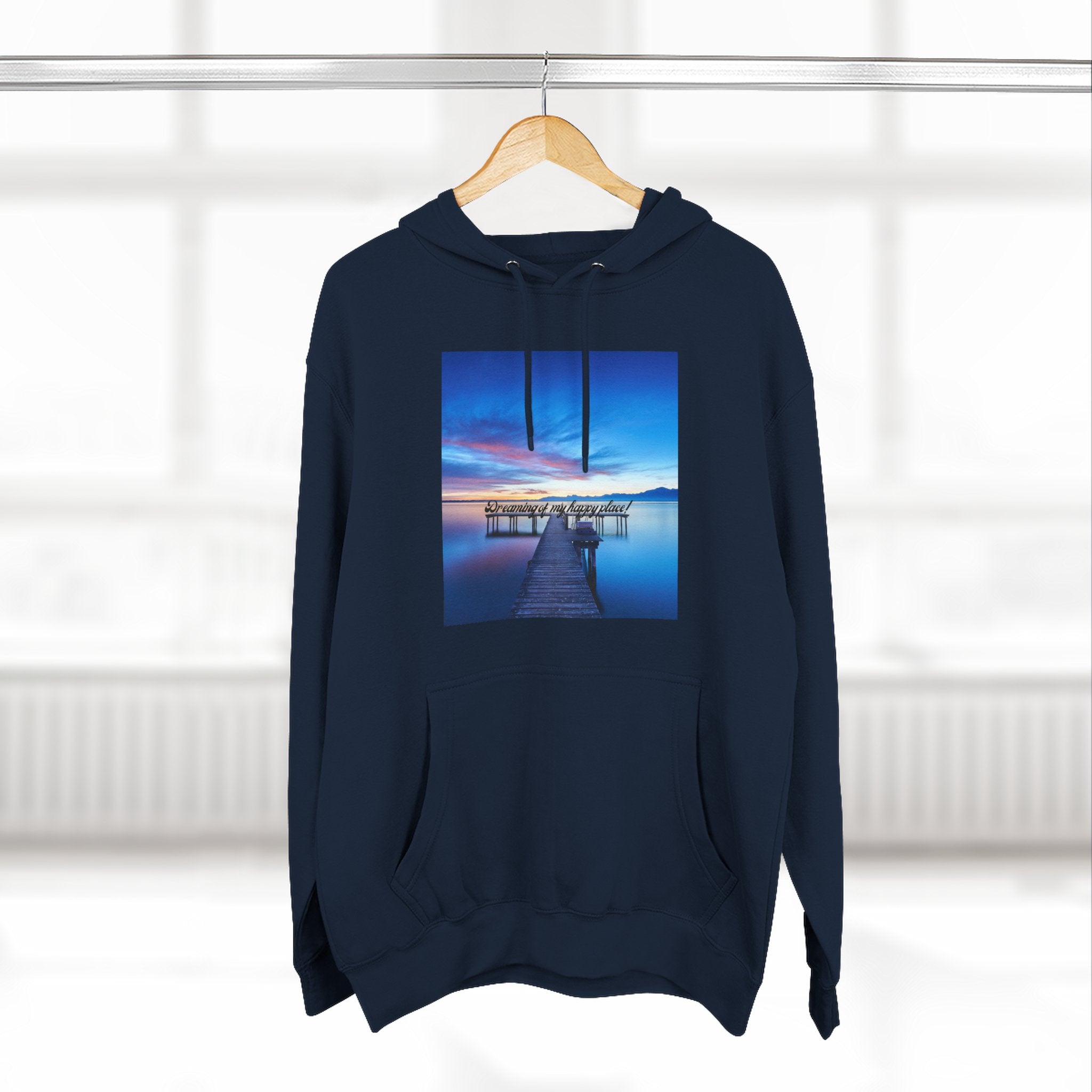 Navy pullover hoodie with hood and front pocket, dock photo graphic on the chest