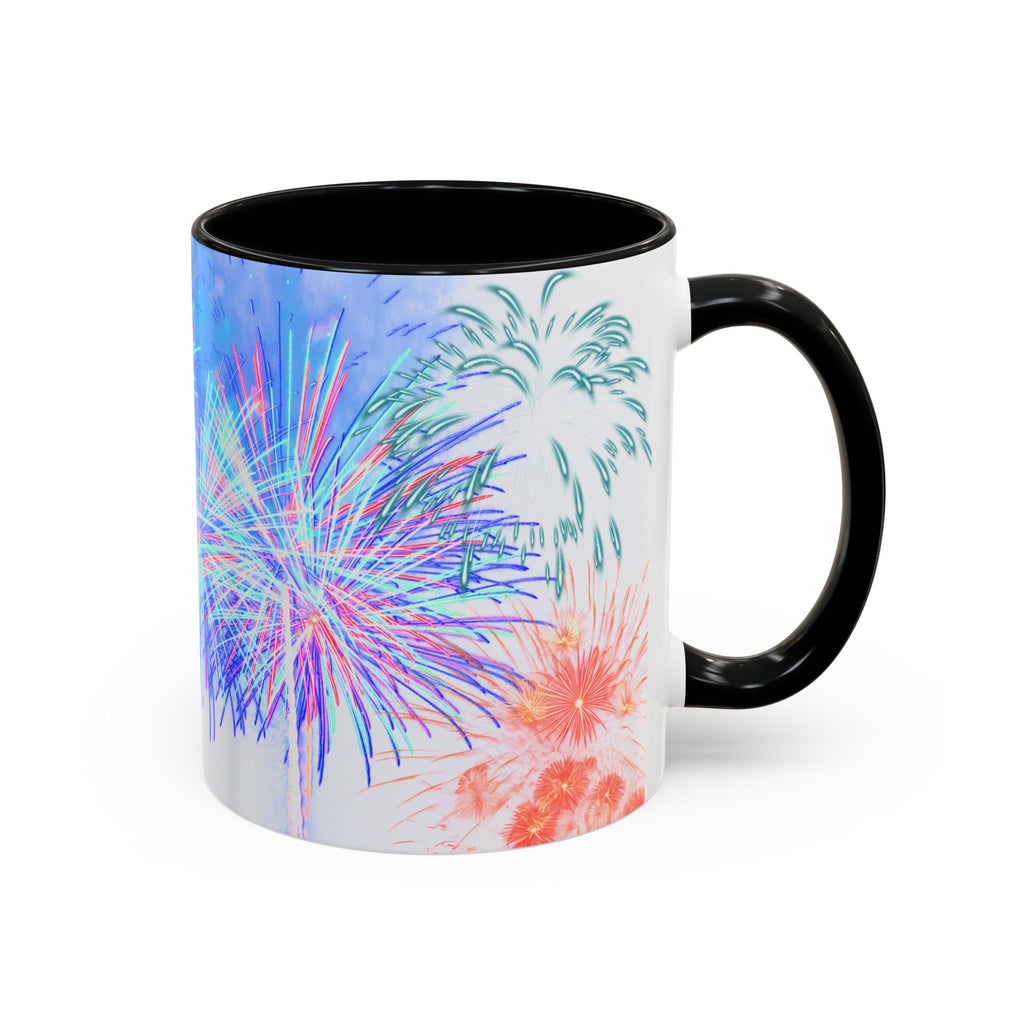 Ceramic coffee mug with colorful fireworks on white, black rim and handle.