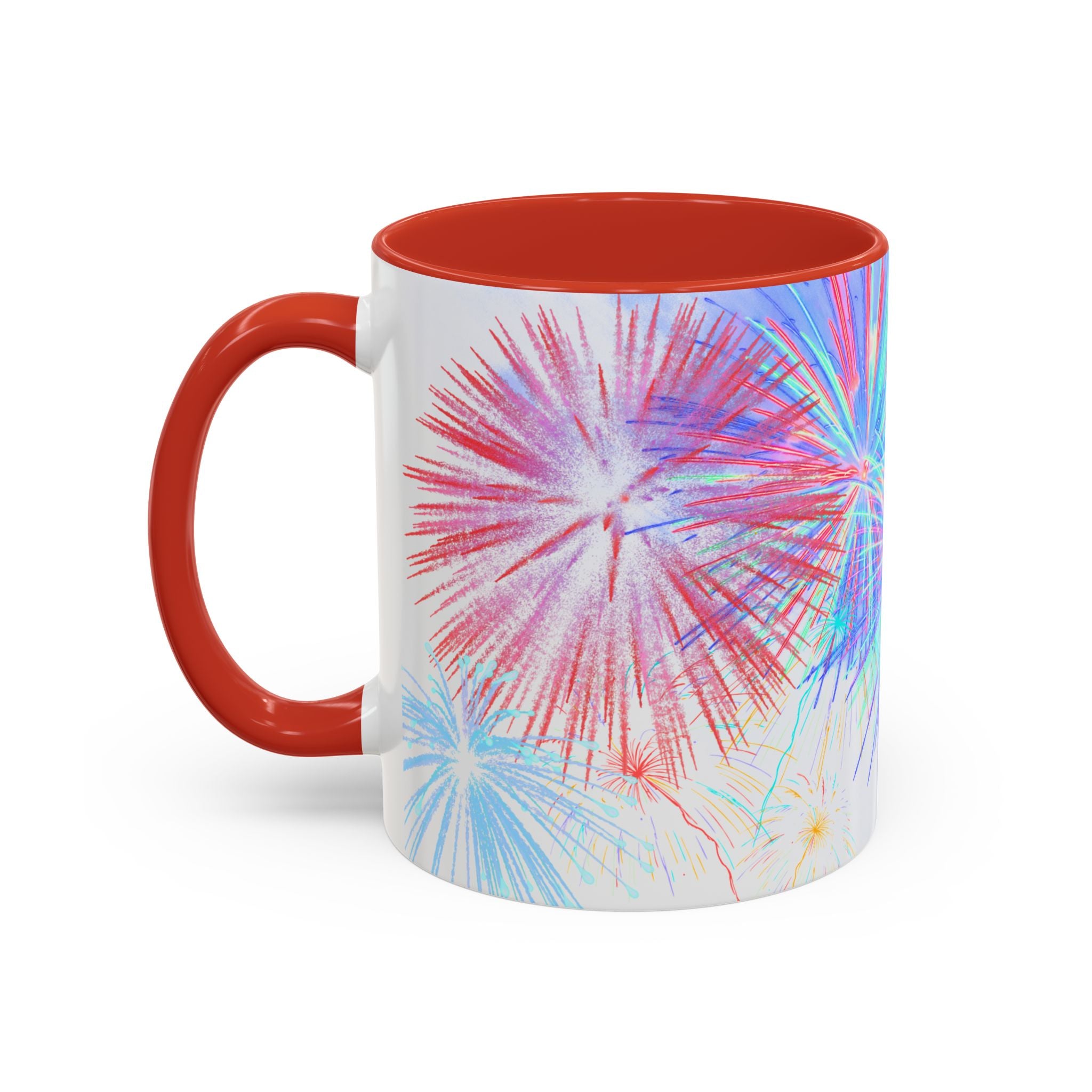 Ceramic coffee mug with red-orange handle, colorful fireworks print, white body, red-orange interior