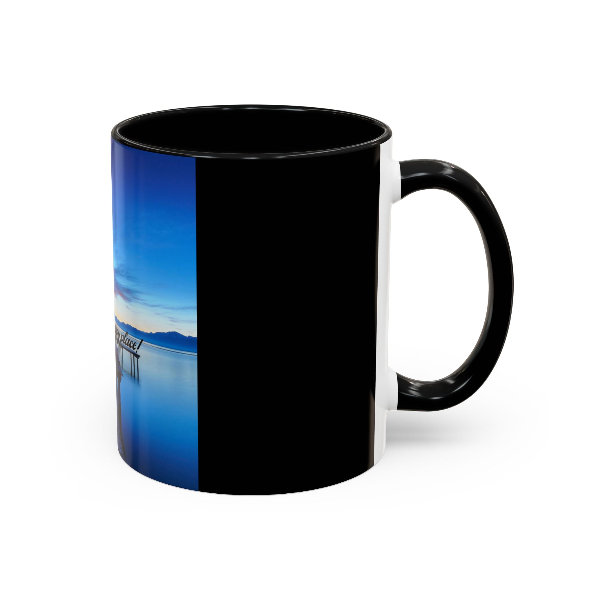 Coffee mug with blue front, black panel, dock artwork, and side handle