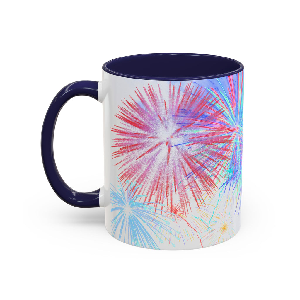 Ceramic coffee mug with navy handle, large colorful fireworks, white body, navy interior