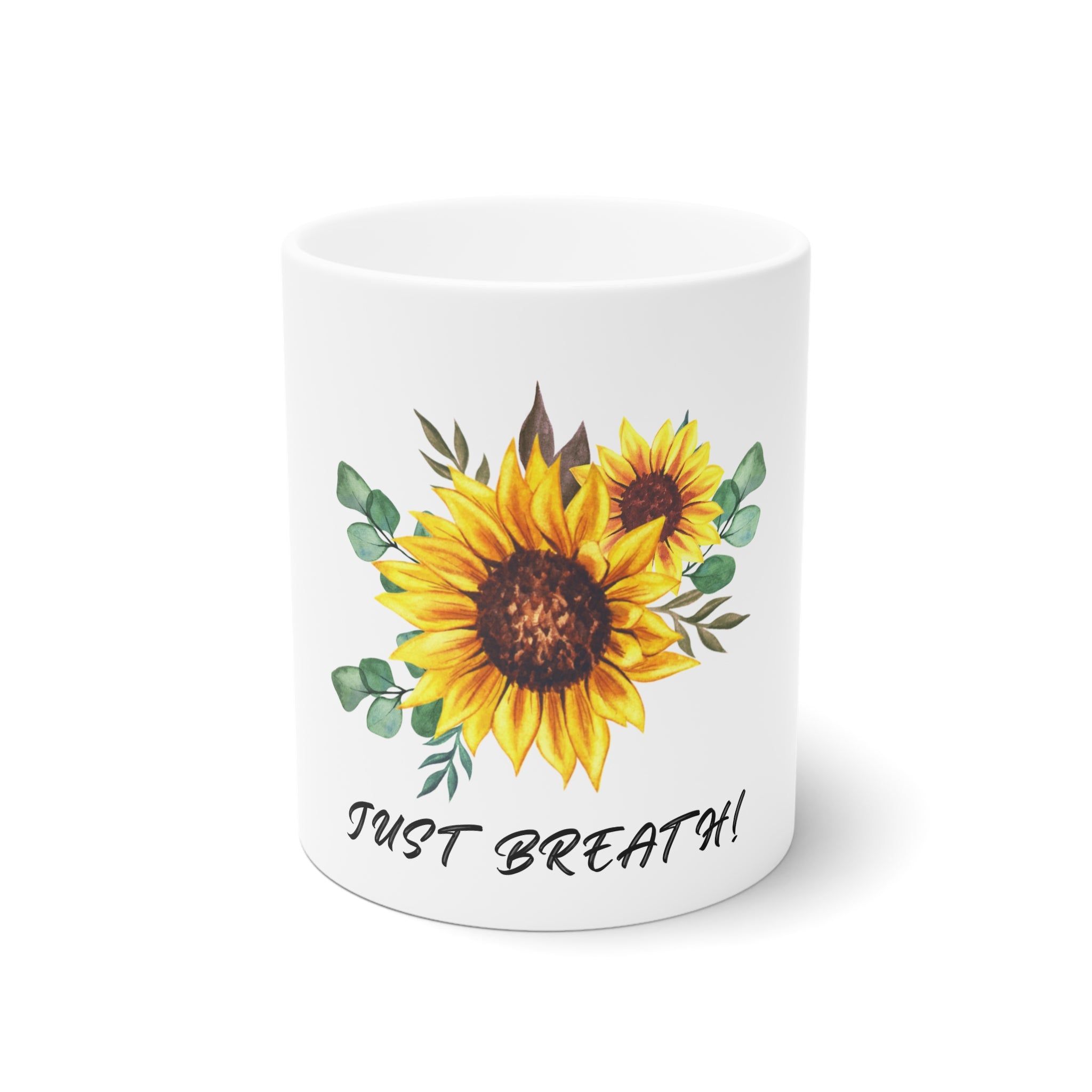 White ceramic mug with sunflower illustration and “Just Breathe!” text