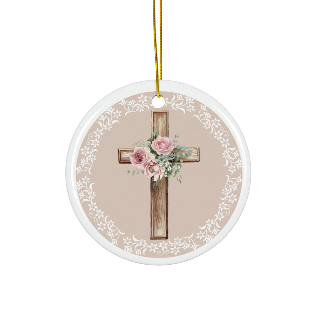 Round ceramic cross ornament with pink roses and floral accents, white lace border, gold cord