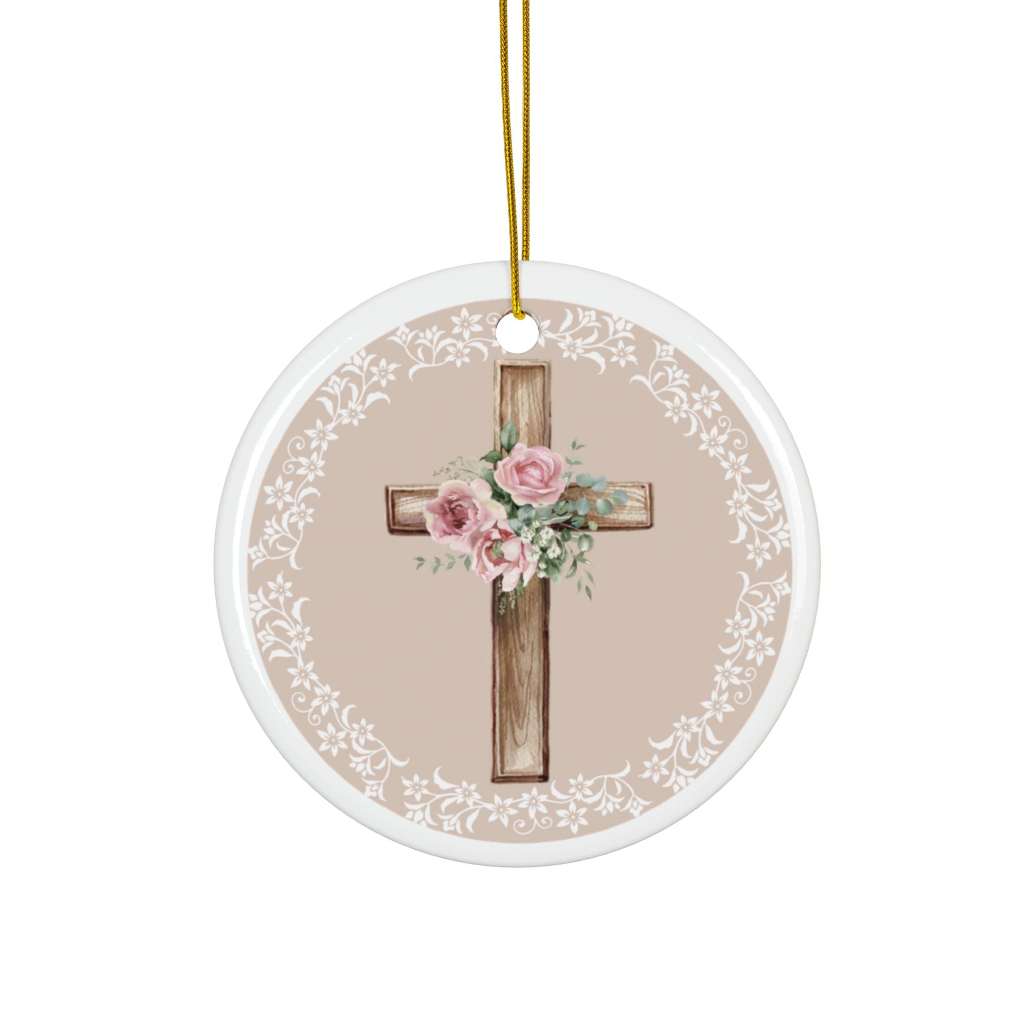 Round ceramic cross ornament with pink roses and floral accents, white lace border, gold cord