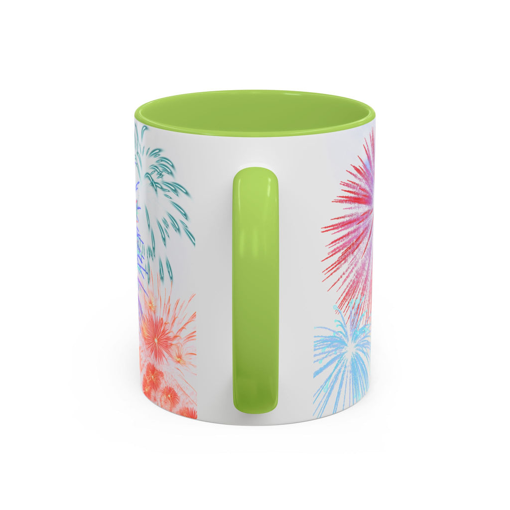 Green ceramic coffee mug with colorful fireworks print and molded green grip on front