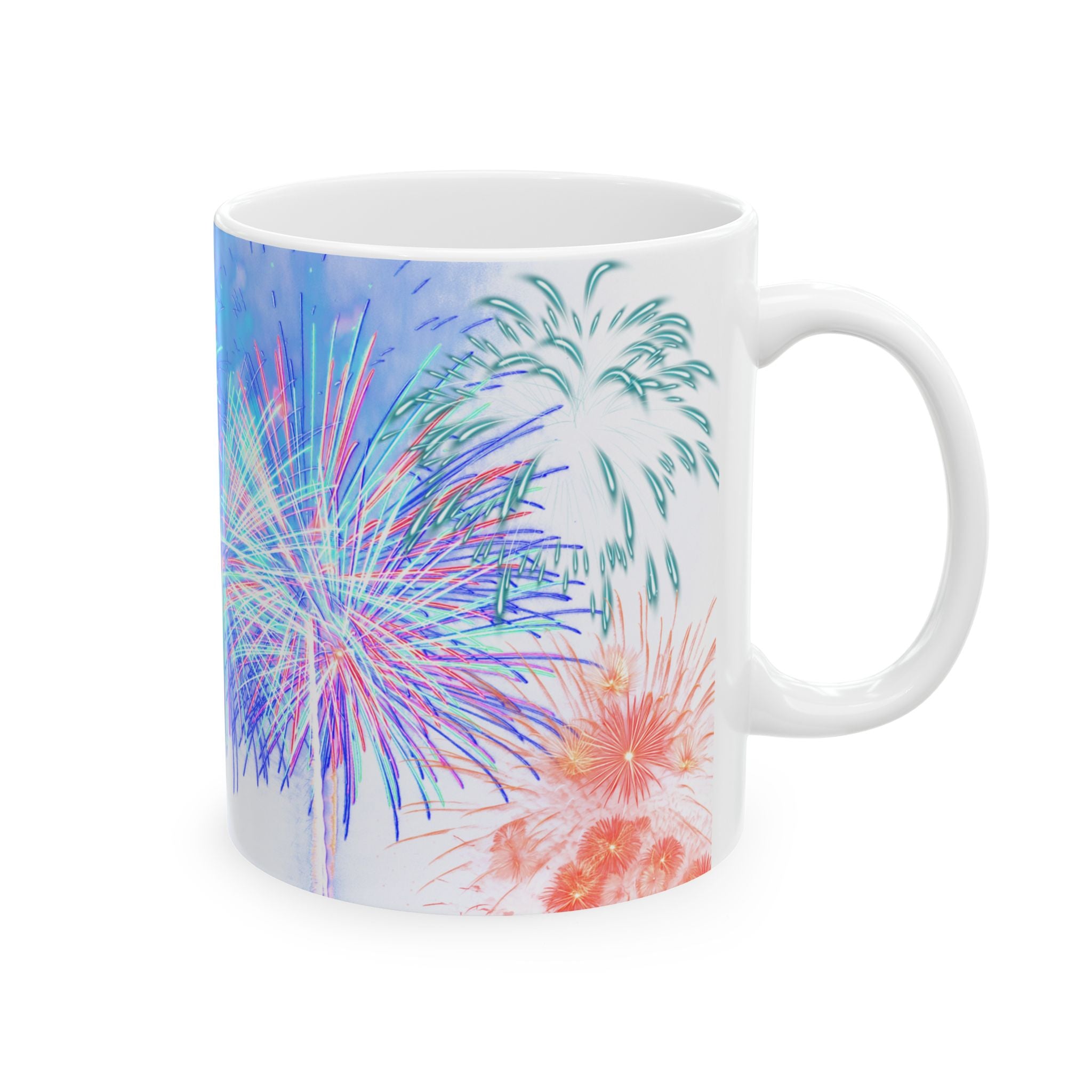 White ceramic mug with side handle and green, blue, and pink fireworks pattern