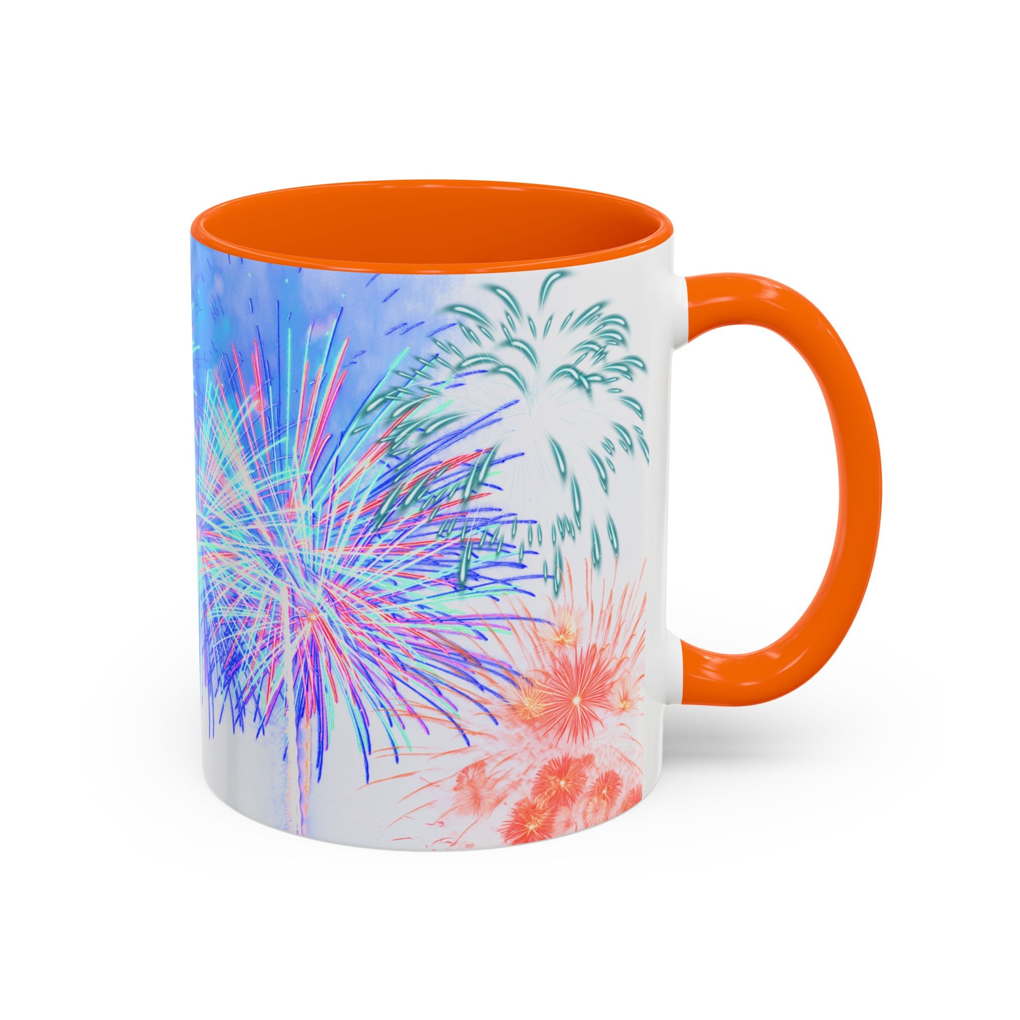 Ceramic coffee mug with orange rim and handle; white body with colorful fireworks print.