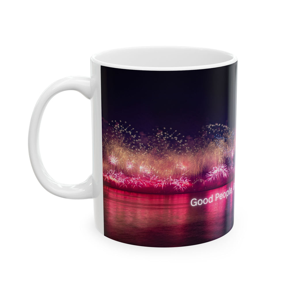 Ceramic mug with neon nightscape fireworks, “Good People,” text, and white handle