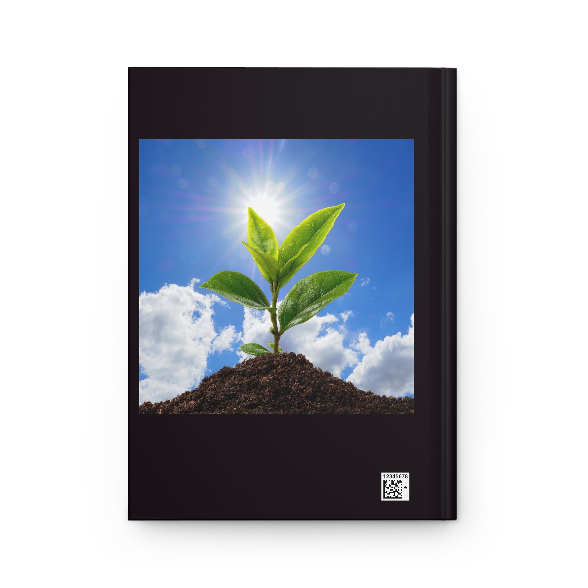 Black hardcover notebook front cover with sprout graphic and barcode label at bottom right