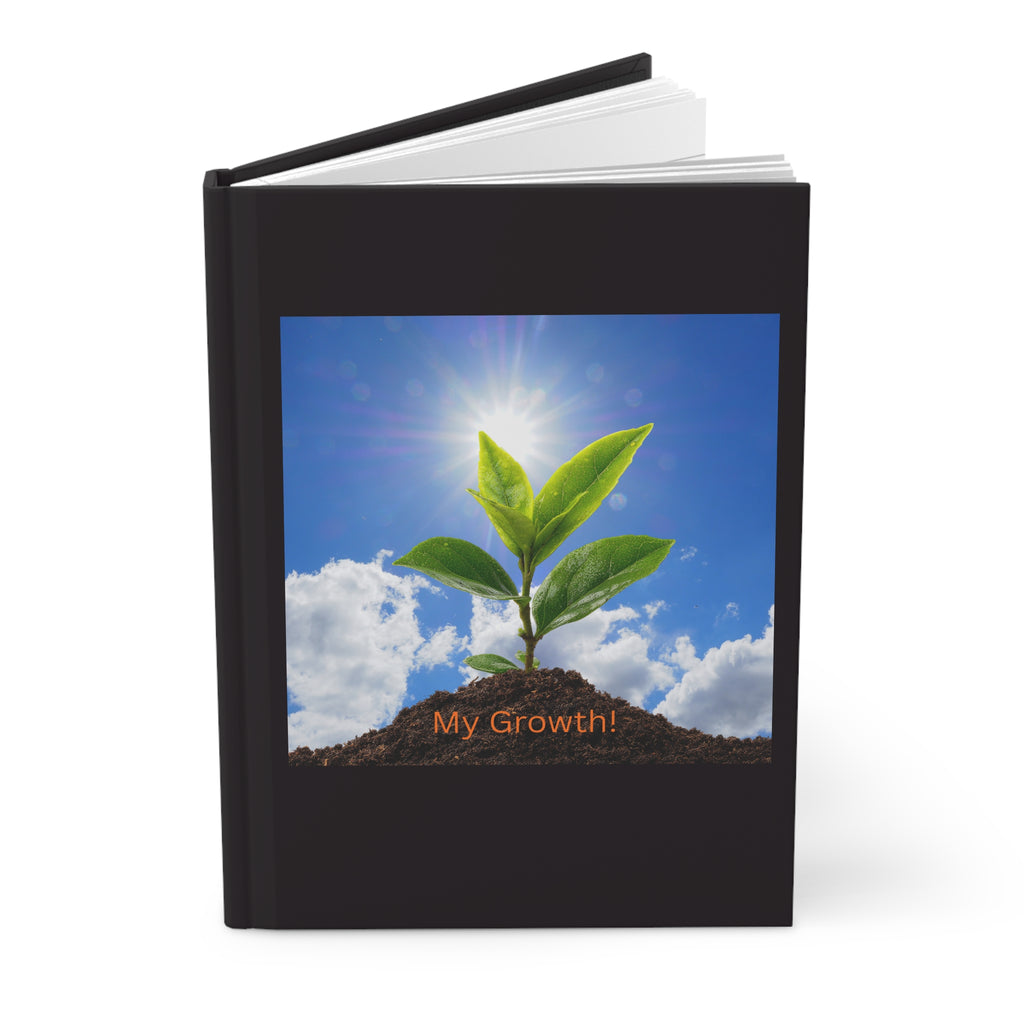 Black hardcover notebook with plant cover art and "My Growth!" text on front