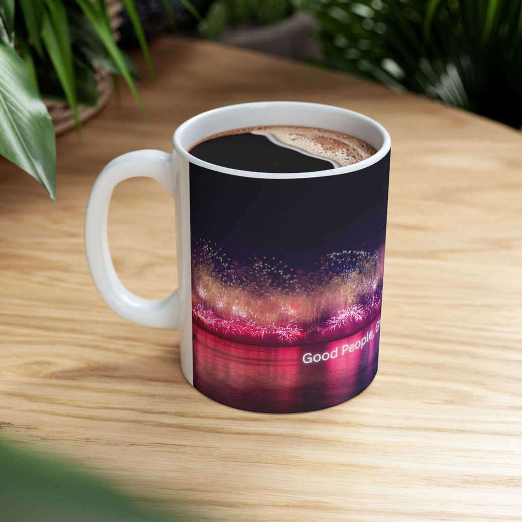 Ceramic mug with neon nightscape fireworks and “Good People” quote on front