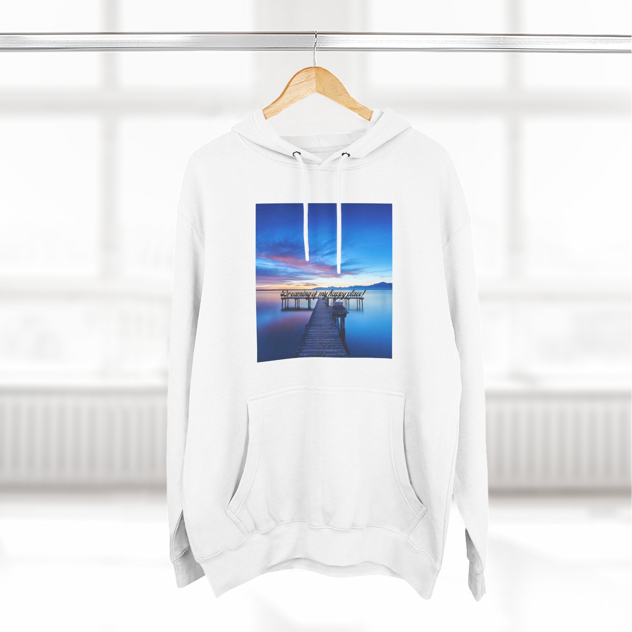 White pullover hoodie on hanger with front square scenic dock graphic
