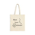 Natural canvas tote bag with "Must Love Animals!" text and paw print hearts design
