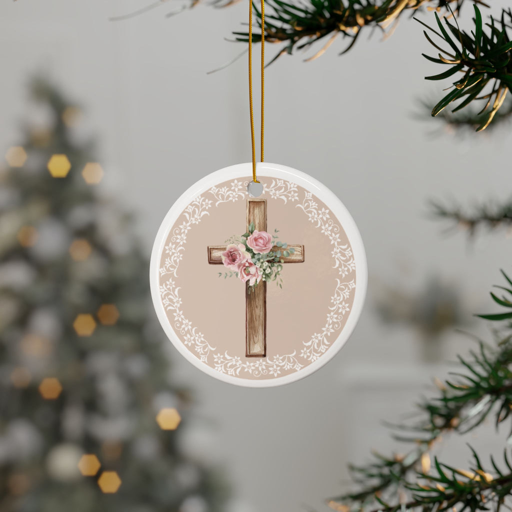 Single round ceramic cross ornament with pink flowers on wood cross, hanging